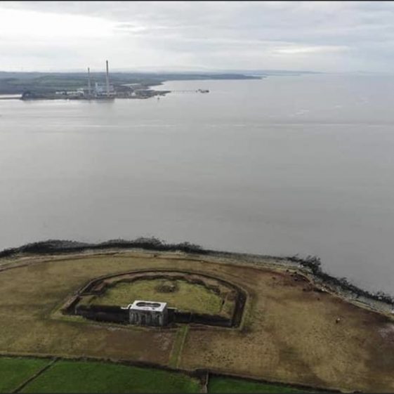 Kilkerrin Napoleonic Quadrangular Tower and Battery with view across the River Shannon to Tarbert Oil Fired Station which was built on the site of the Tarbert Napoleonic Quadrangular Tower and Battery.  | David O’Gorman