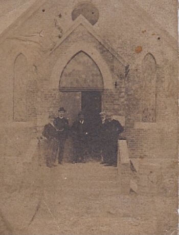 Here is the photo of The Crook Memorial church in Kilkee around 1901.The quality isn't great but it is 120 years old. My mother told me the gentleman in the middle was her GF John Ronan. She lived in the house in Kilrush with him, until his death in 1934. The path doesn't look made up and possibly there are paving slabs to the left of the steps? Makes me think photo as building nearing completion. The stained glass windows can just be made out. | Marie Conroy